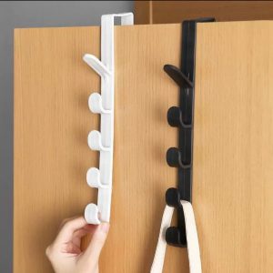 Long row of hooks behind the door